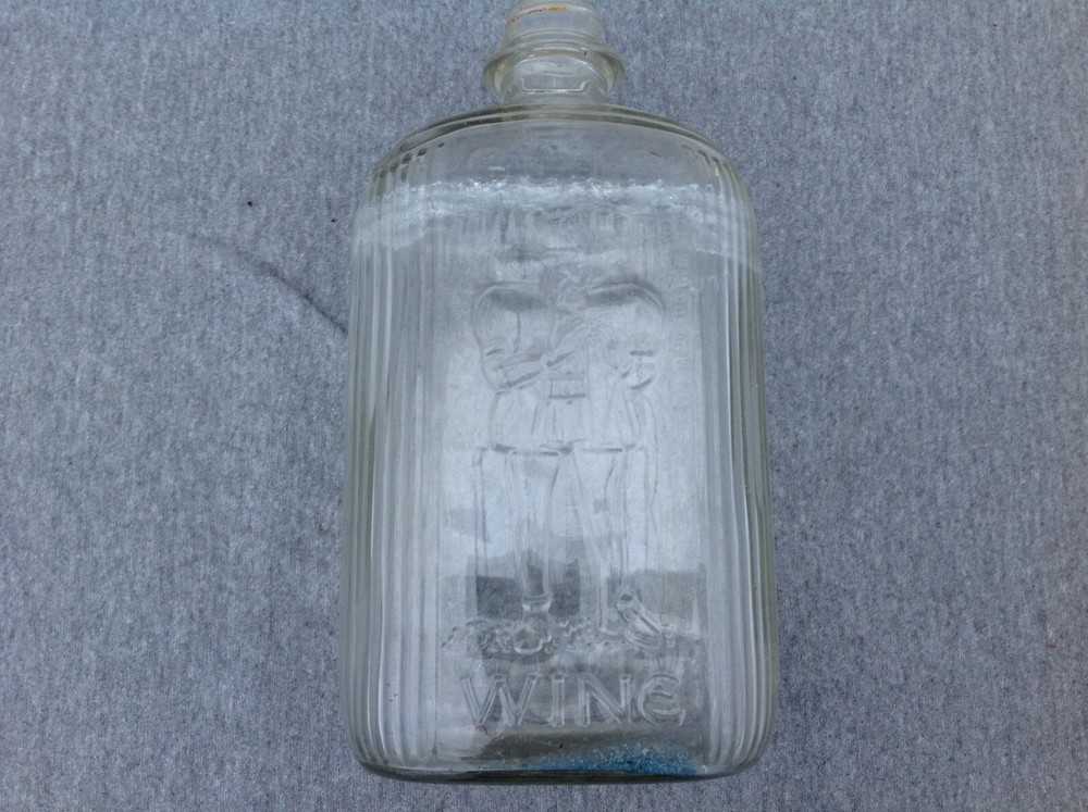 Guild Wine Embossed Glass Bottle