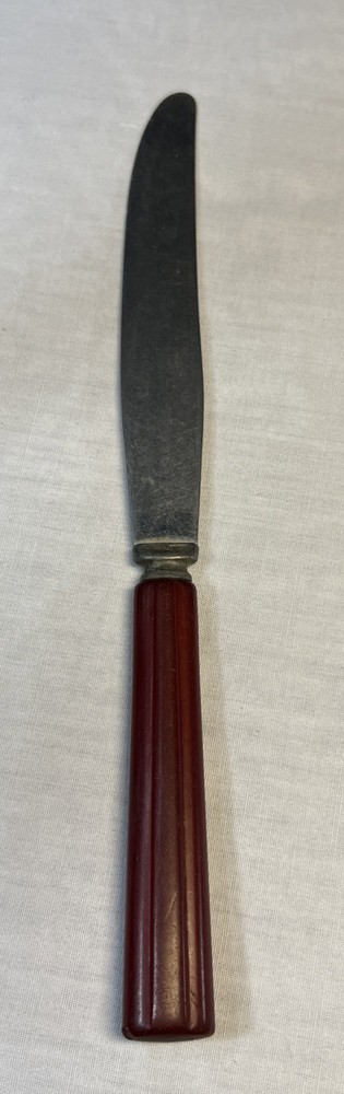 8 3/4” Red Bakelite Dinner Knife