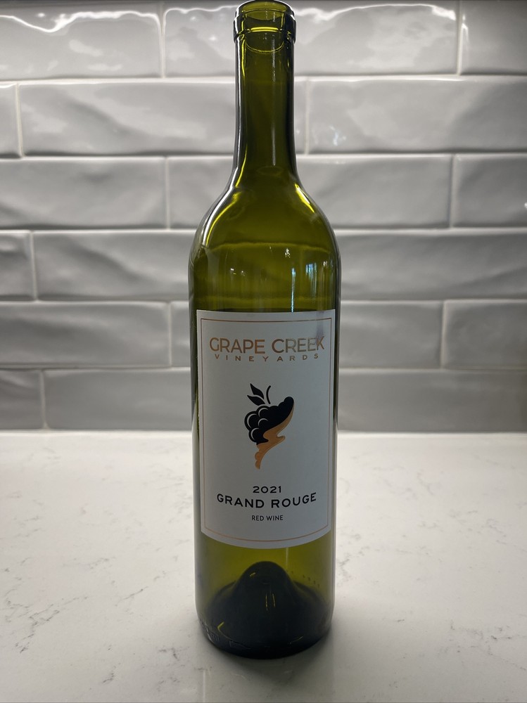 Empty Grape Creek Wine Bottle