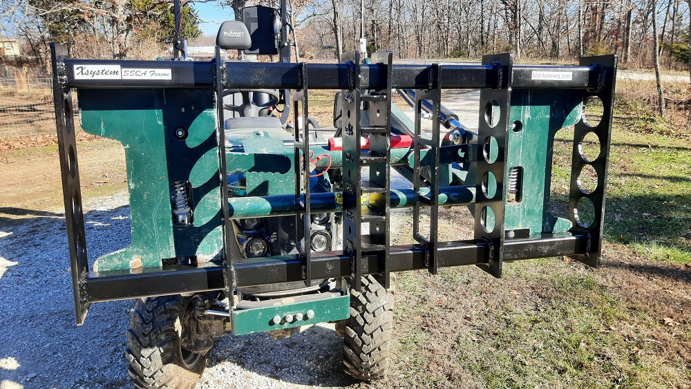 Skid Steer quick attach frame for Xsystem attachments.
