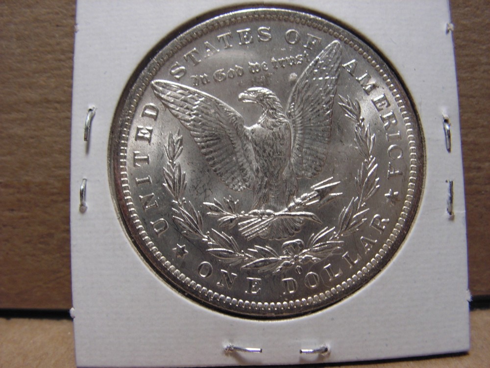 1884 - O Morgan Silver Dollar, UNC.