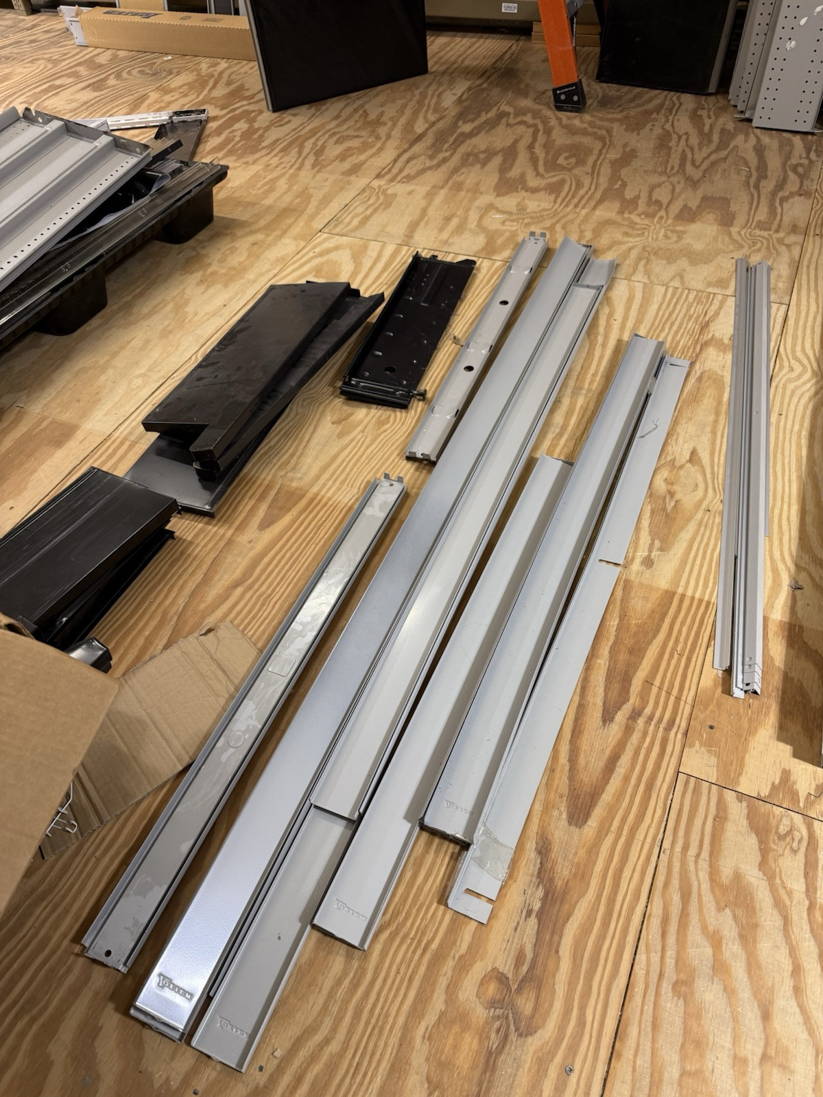 HUGE lot of pallets of Used Lozier Shelving shelves, components, glass cases