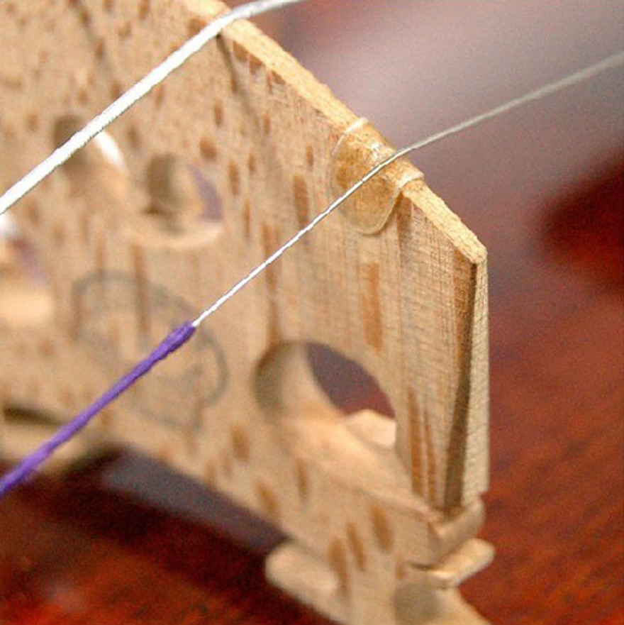 50x Violin - Viola Bridge Parchments Leather Protector E String Stop Gut in