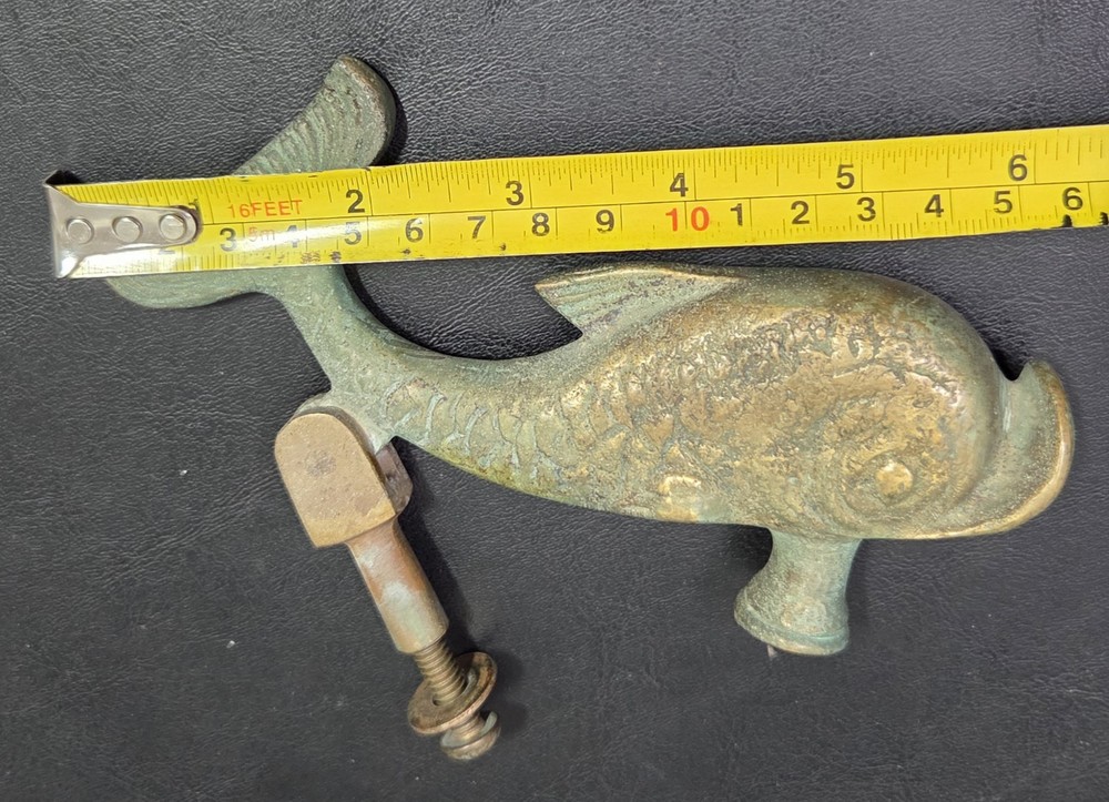 antique brass fish/dolphin door knocker