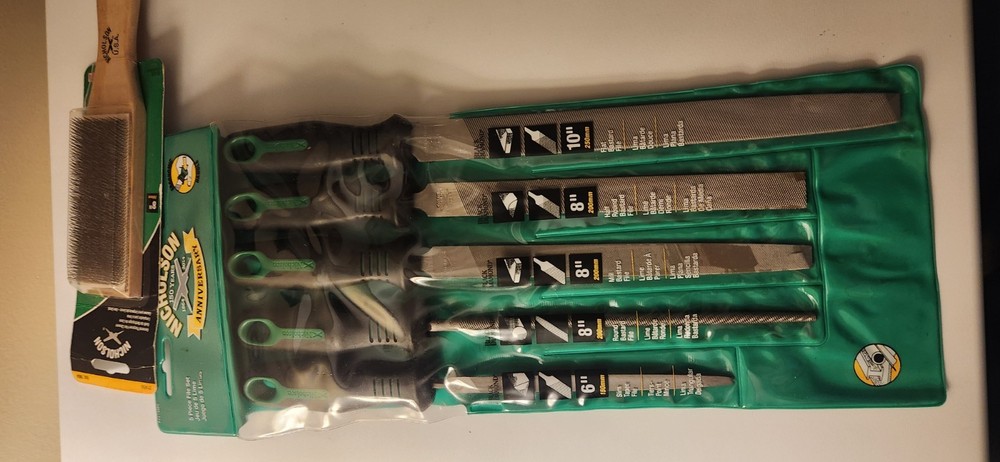 2 file sets and a cleaning brush for them