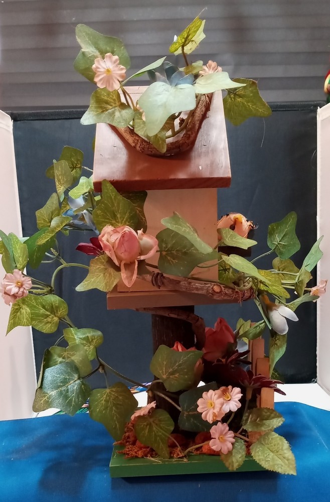 VINE COVERED BIRDHOUSE