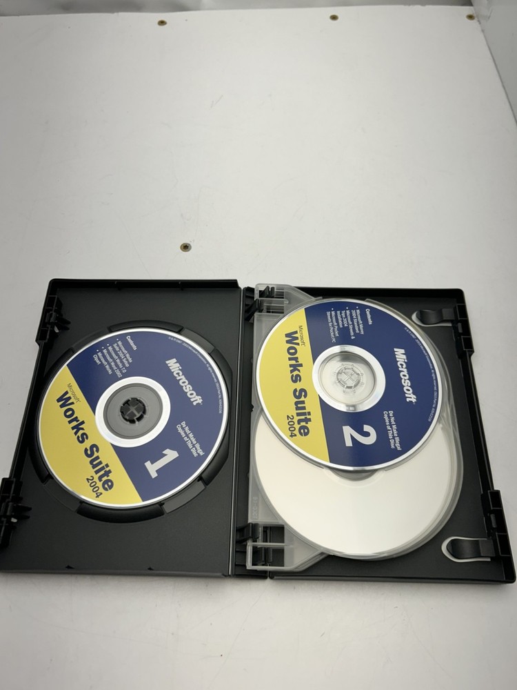 Microsoft Works Suite 2004 PC Software 5 disc and Key