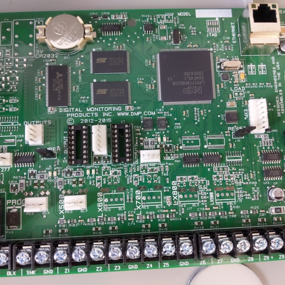 DMP XR150NL-G Network Panel Assembly and Accessories.