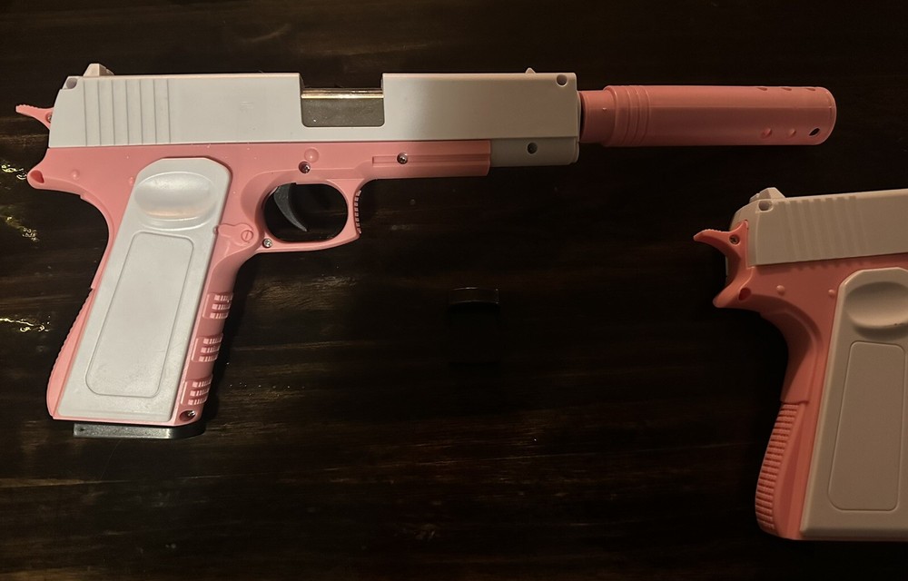 Pink Soft Bullet Shell Ejecting Pistol With Silencer