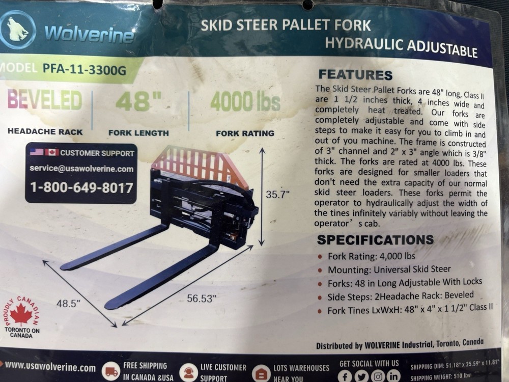 skid steer forks with hydraulic width adj.