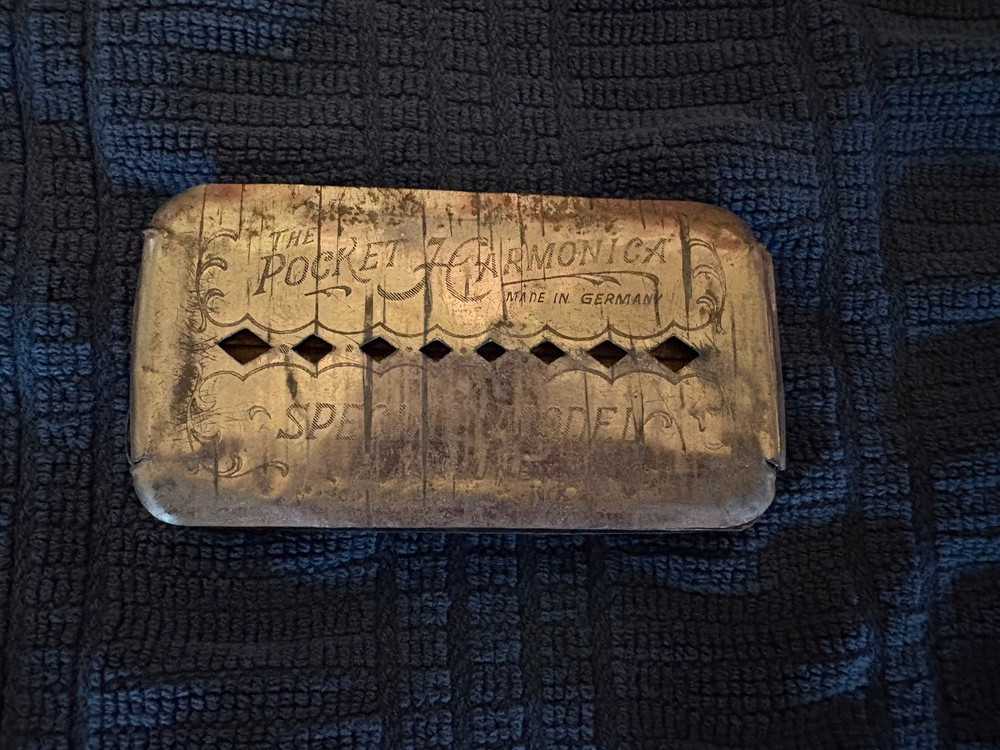5 vintage Harmonicas. Beautiful instruments