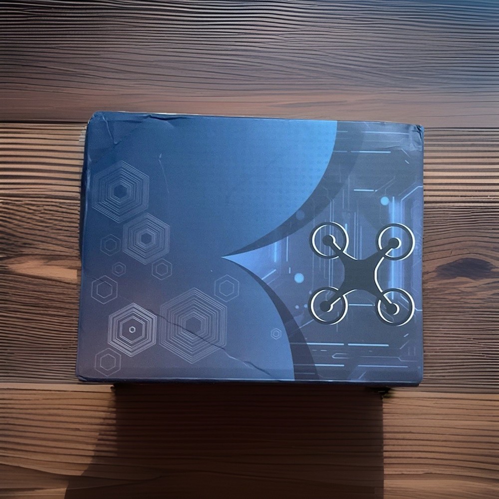 New E99 Foldable Mini Drone Kit w/ 2 Batteries & Carrying Case