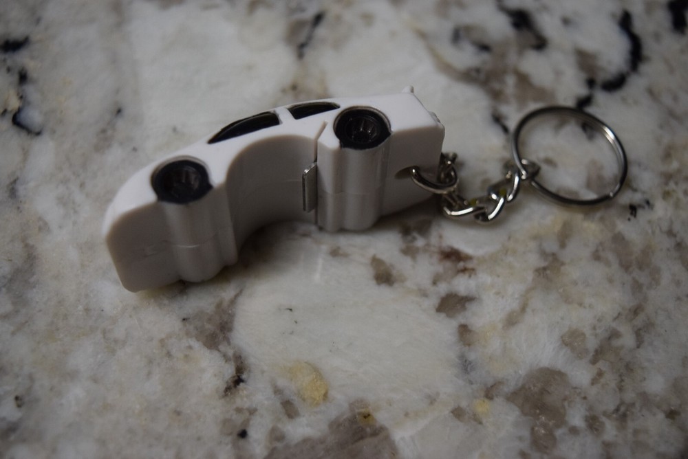 WHITE RACE CAR SHAPE KEYCHAIN BEER BOTTLE OPENER