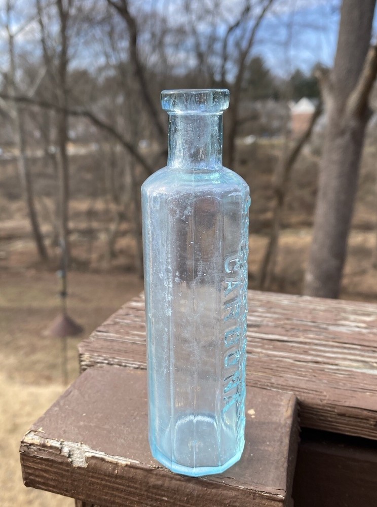 Carbona Products Co 12-sidesd Blown Bottle