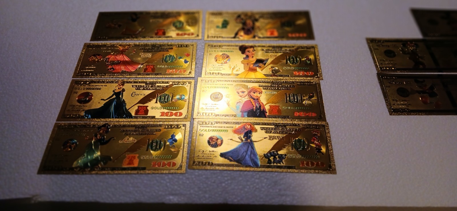 Lot of 80 novelty US coins and bills.