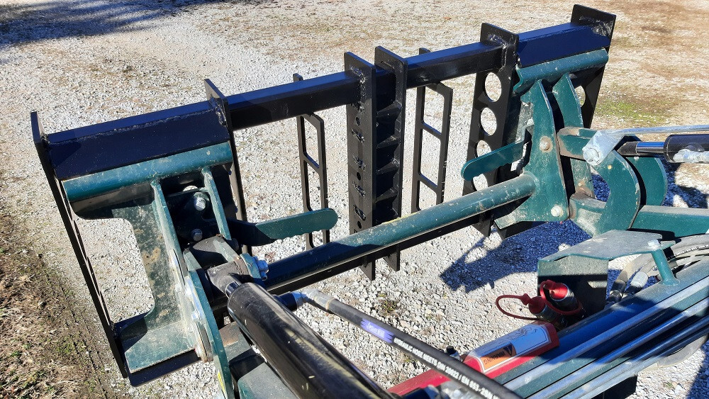 Skid Steer quick attach frame for Xsystem attachments.