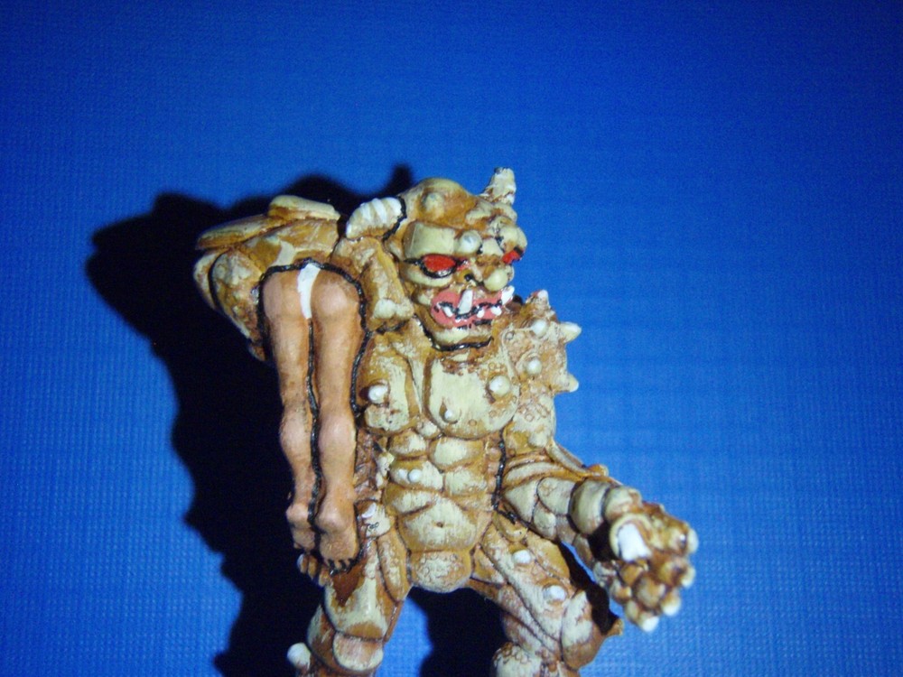 Pulp Troll figure with woman.