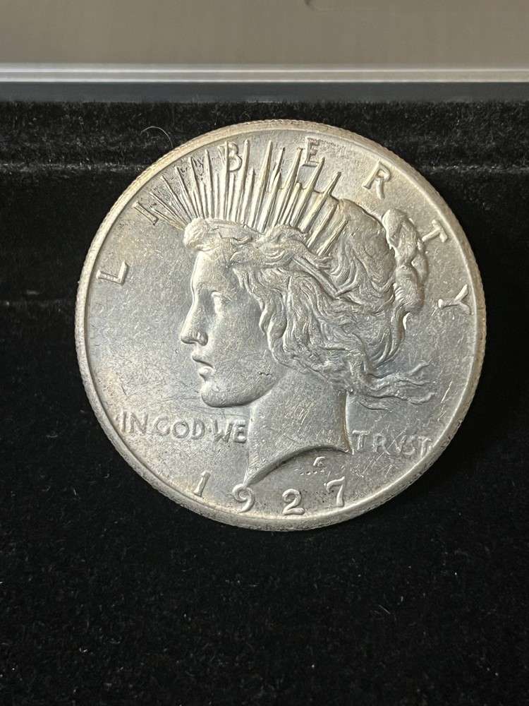 1927 peace dollar Unc