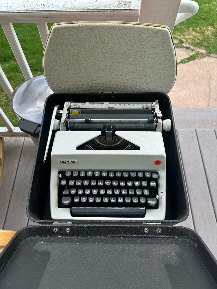 Olympia SM9 Portable Typewriter with case