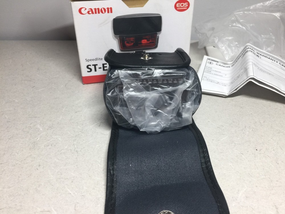 Canon Speedlite Transmitter ST-E2 manual EOS accessory shoe mount flash trigger