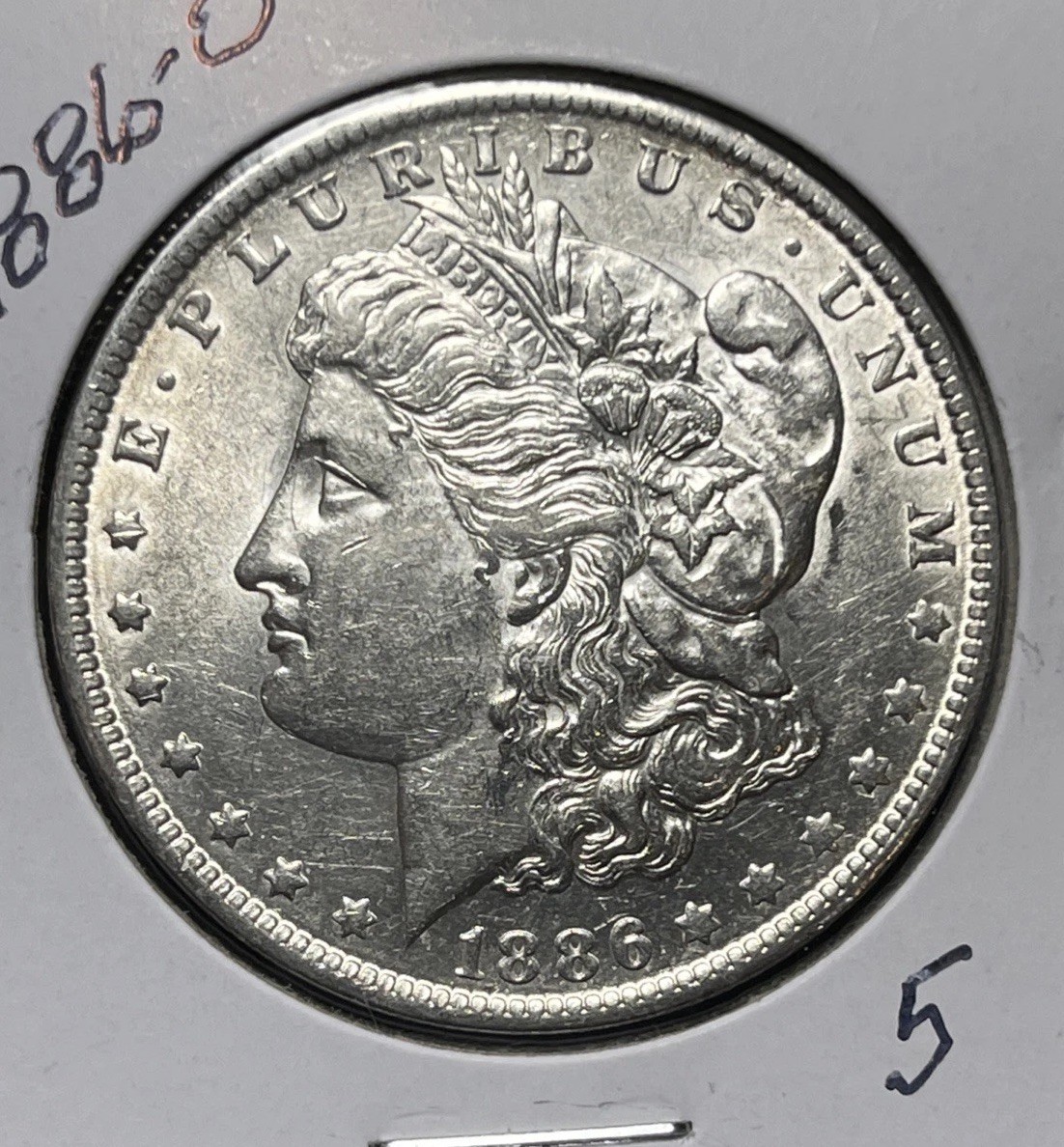 1886-O MORGAN SILVER DOLLAR, AU DETAILS