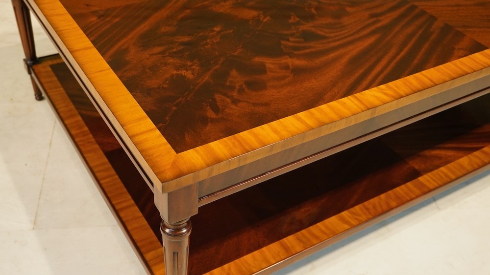 Rectangular Flamed Mahogany Coffee table with banding and lower shelf
