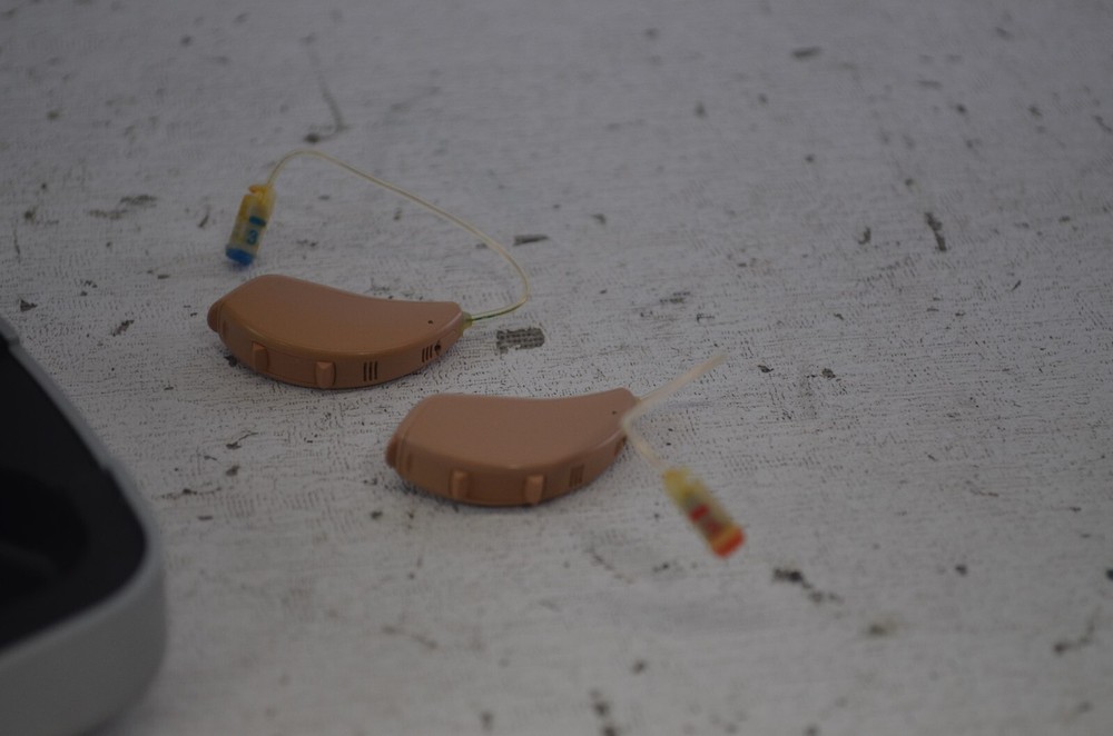 Resound Hearing Aids as is not tested missing button , might affect function