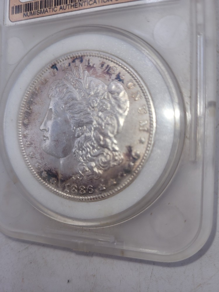 1886 Morgan Silver Dollar – Mint State – 90% Silver – Encapsulated