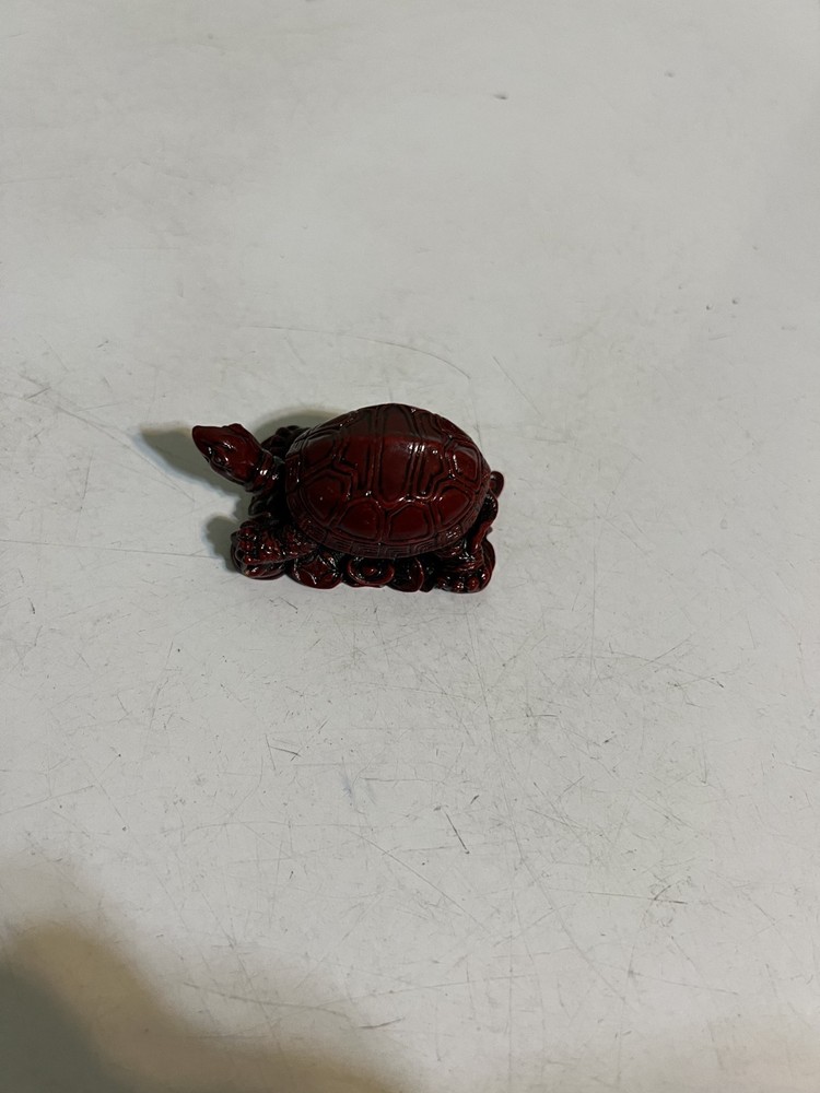 Tiny unique red brown turtle figurine