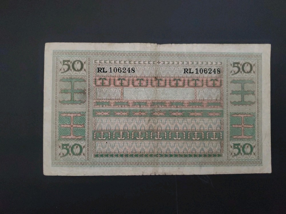 Indonesia 50 Rupiah 1952 REPLACEMENT Ripped Circulated