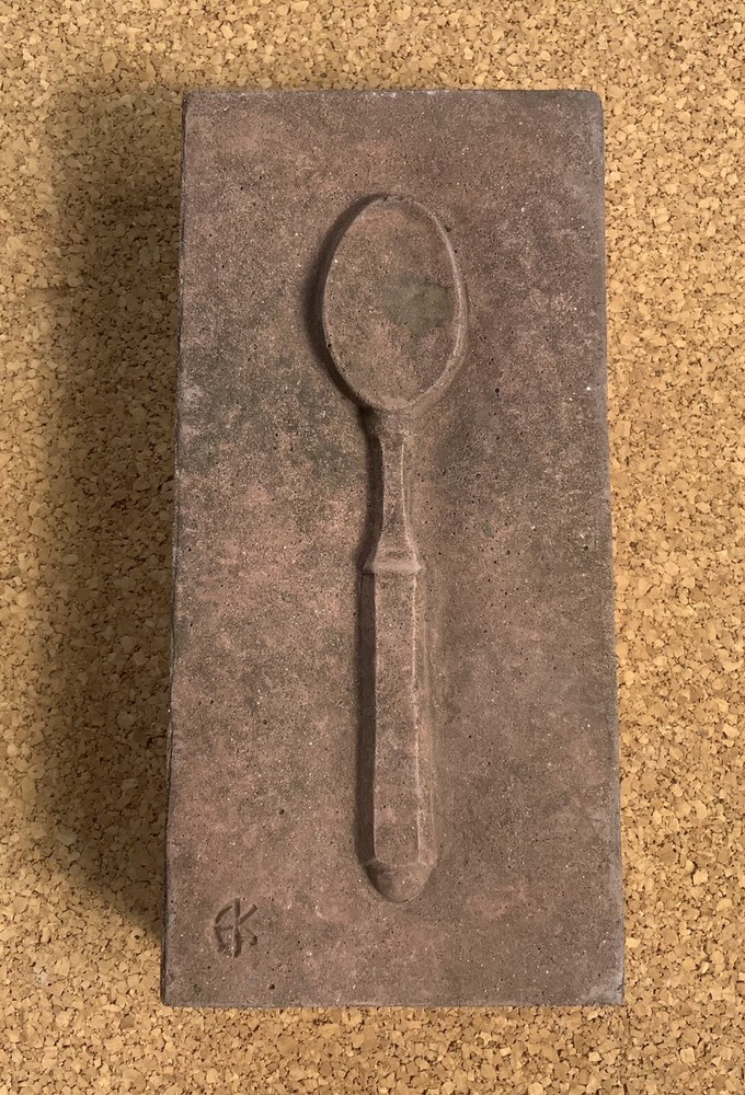 paving brick with spoon