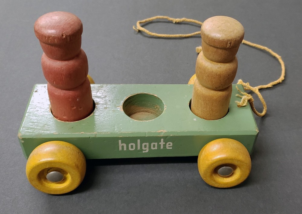 Vintage 1940's Holgate Solid Wood Pull Toy with Removable Colored Pegs  NICE