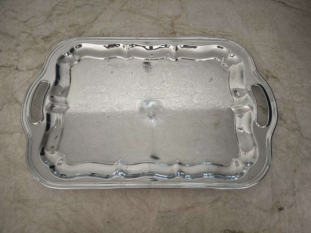Two Chrome Plated Serving Platters, One Irvingware