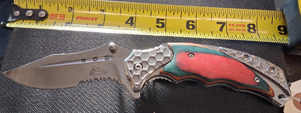 The Bone Edge Damascus Folding Knife