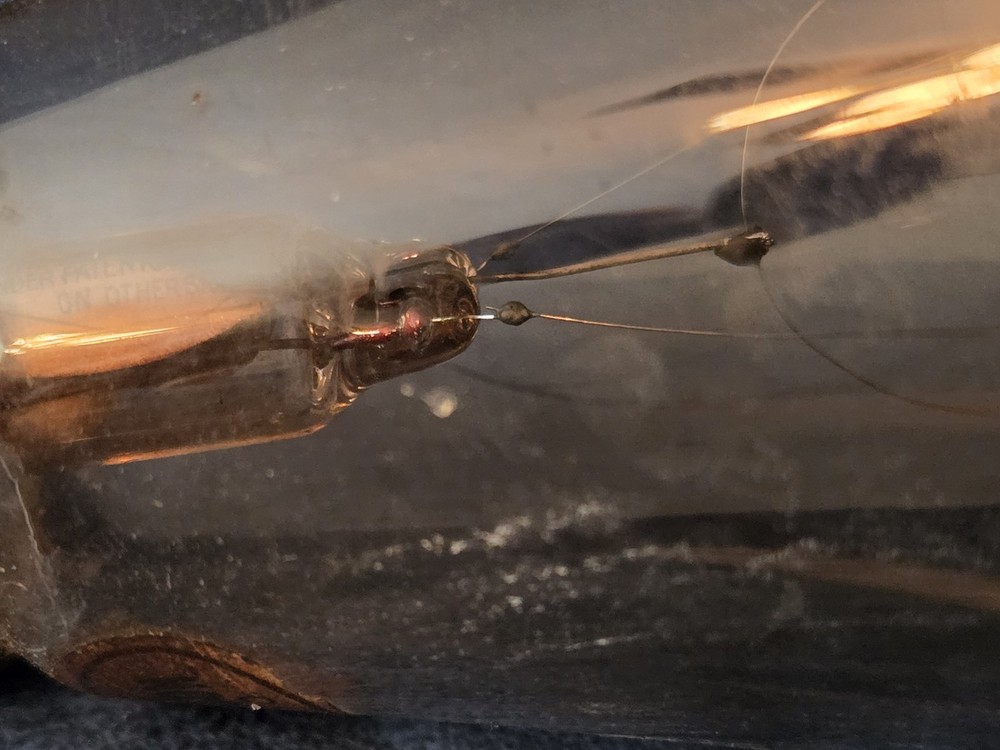 Antique Edison light bulb. Untested.