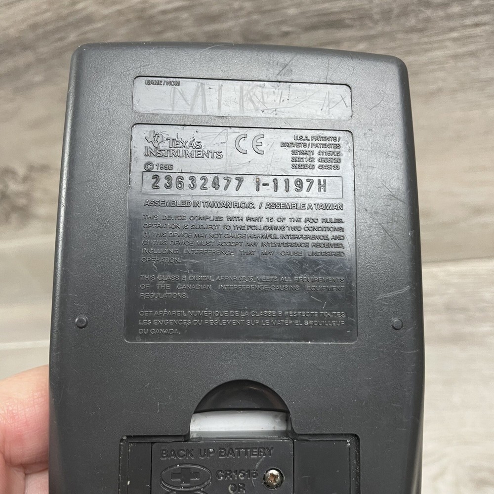 Texas Instruments TI-83 Handheld Graphing Calculator