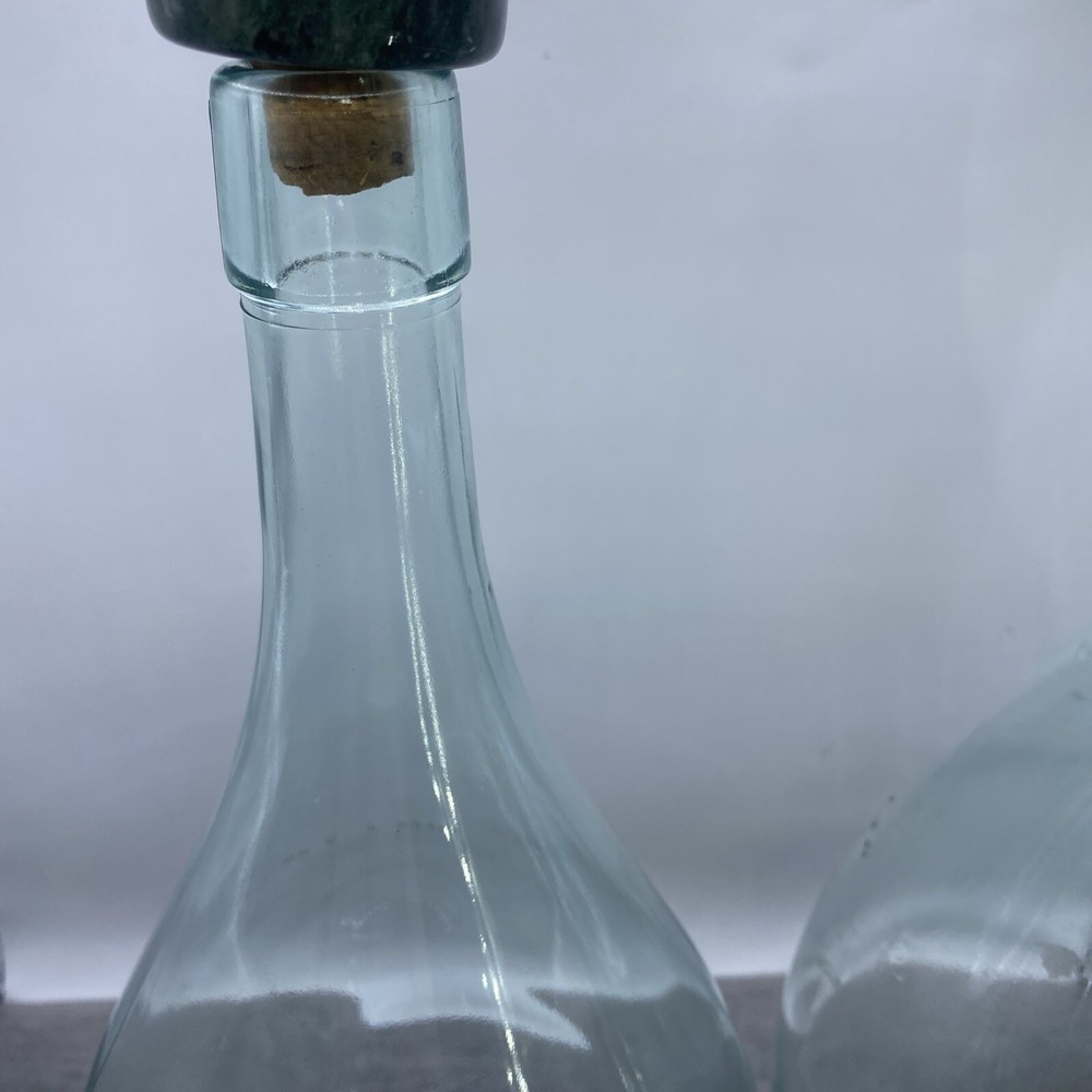 Two old wine bottles - 1 Cork inside - Label Residue