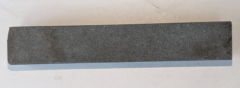 Vintage sharpening stone maybe natural stone , used