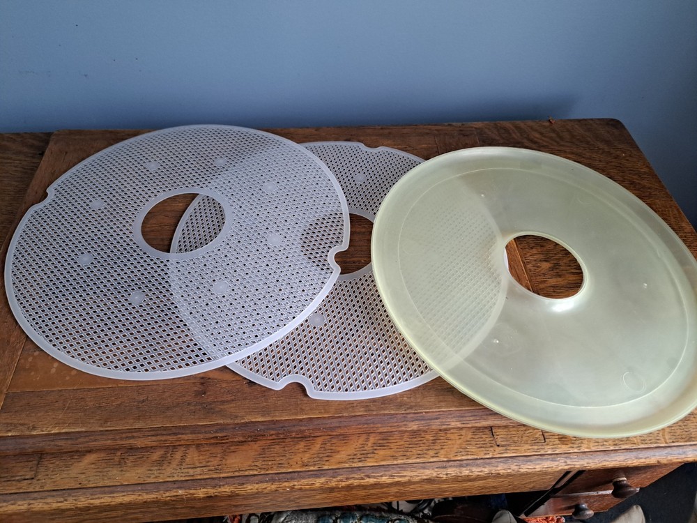 3 round Dehydrator Sheets  -- 2 mesh & 1 fruit leather sheet
