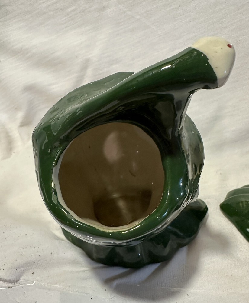 2 ceramic Jester planters.