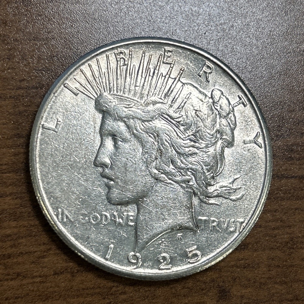 1925-S $1 Peace Silver Dollar AU+