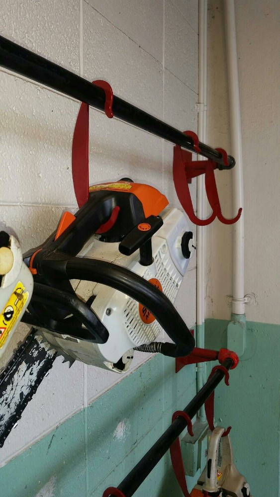 CHAIN SAW HANGER STORAGE HOOK