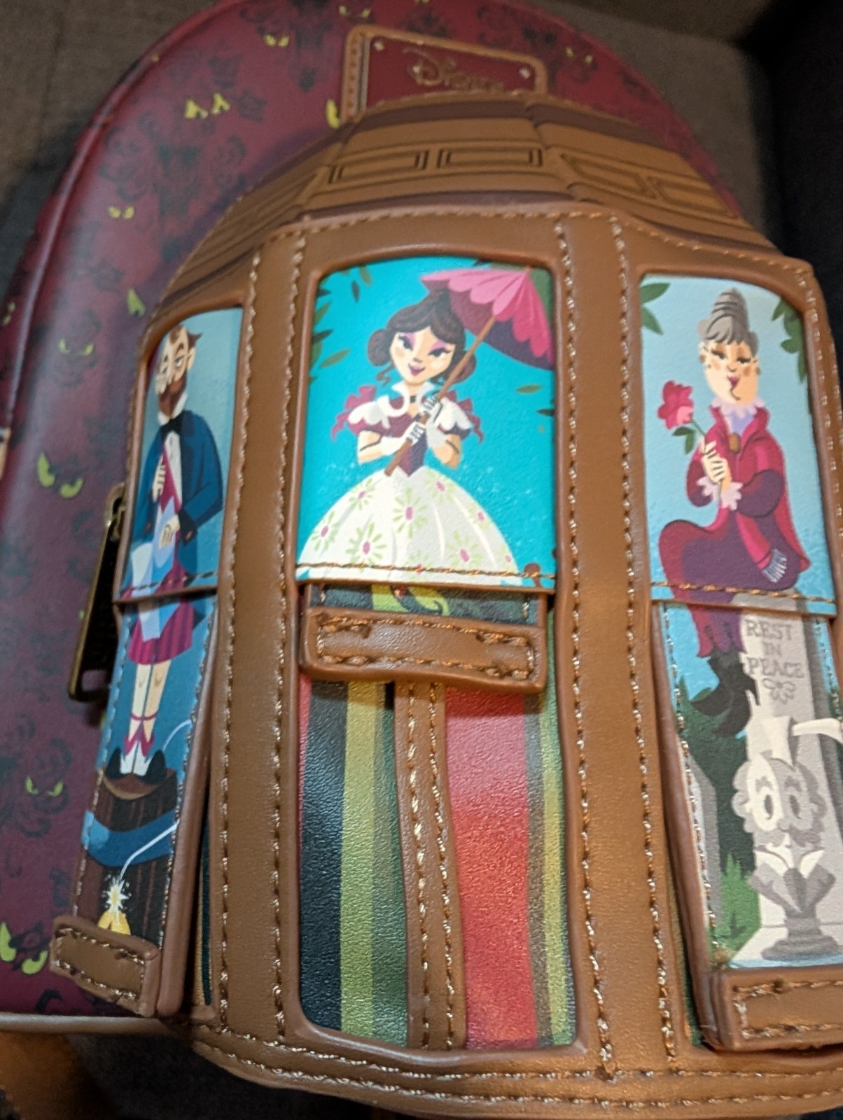 Disney Haunted Mansion Stretching Room Portraits Glow-in-the-Dark Mini Backpack