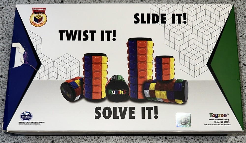 Rubiks Tower Twister Rotate & Slide 3Pack. Open Package