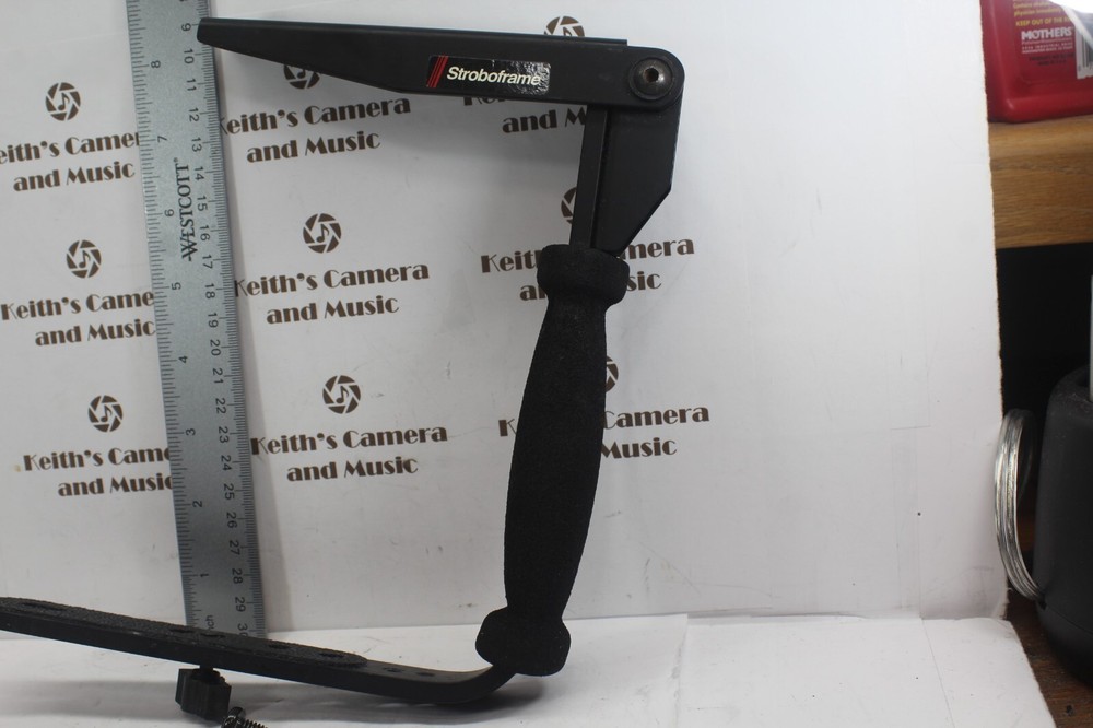 Stroboframe Quick Flip 350 Camera flash bracket Nikon Canon universal + screws!