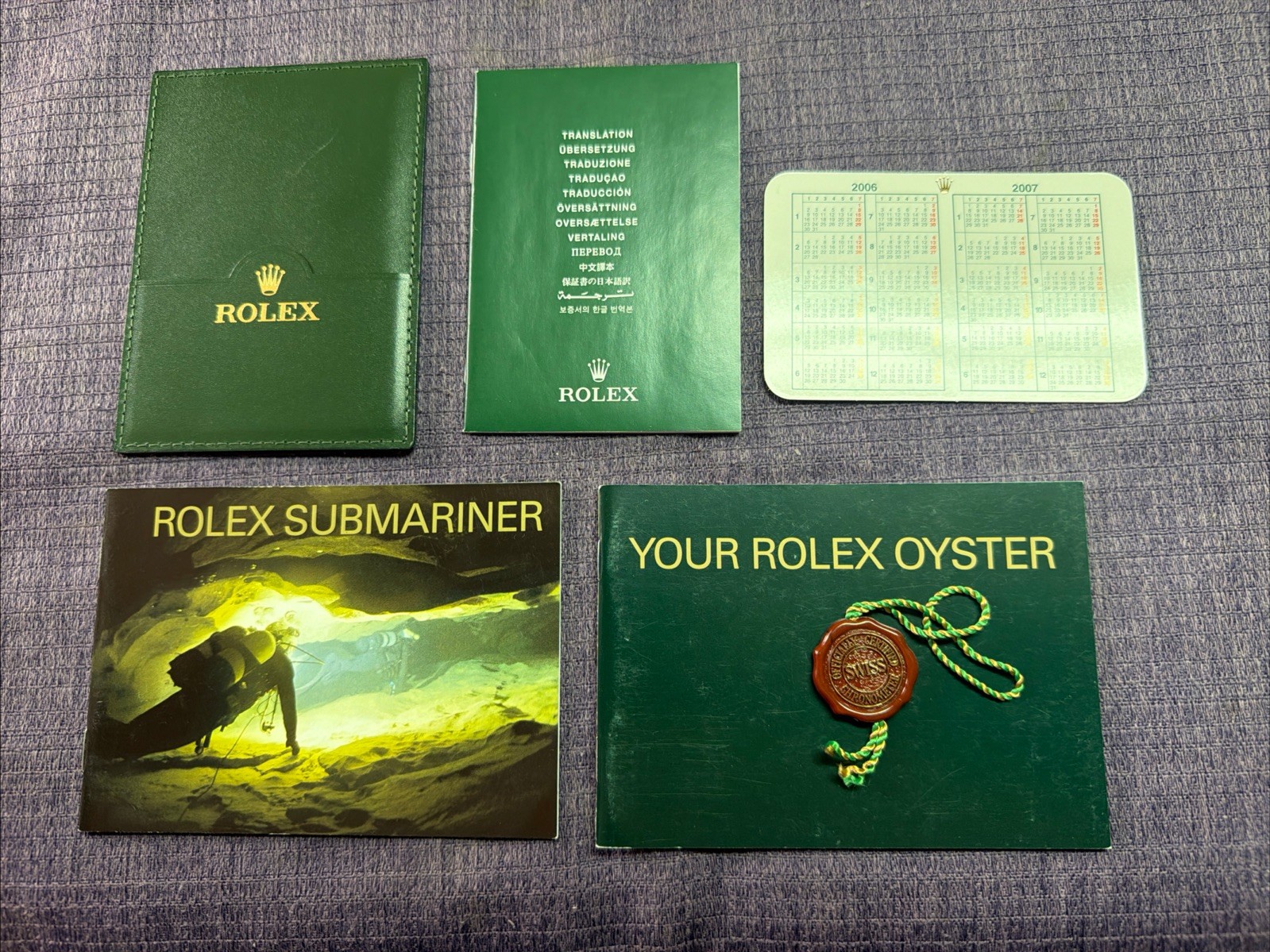 Rolex 2006 Submariner Accessories Set.Booklets;paper hold;Tag;calendar English‼️