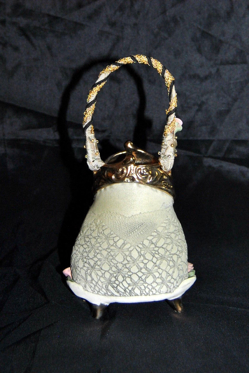 RARE DECORATIVE TEXTURED PORCELAIN PURSE BY LAURA PEERY. Pale Green Signed