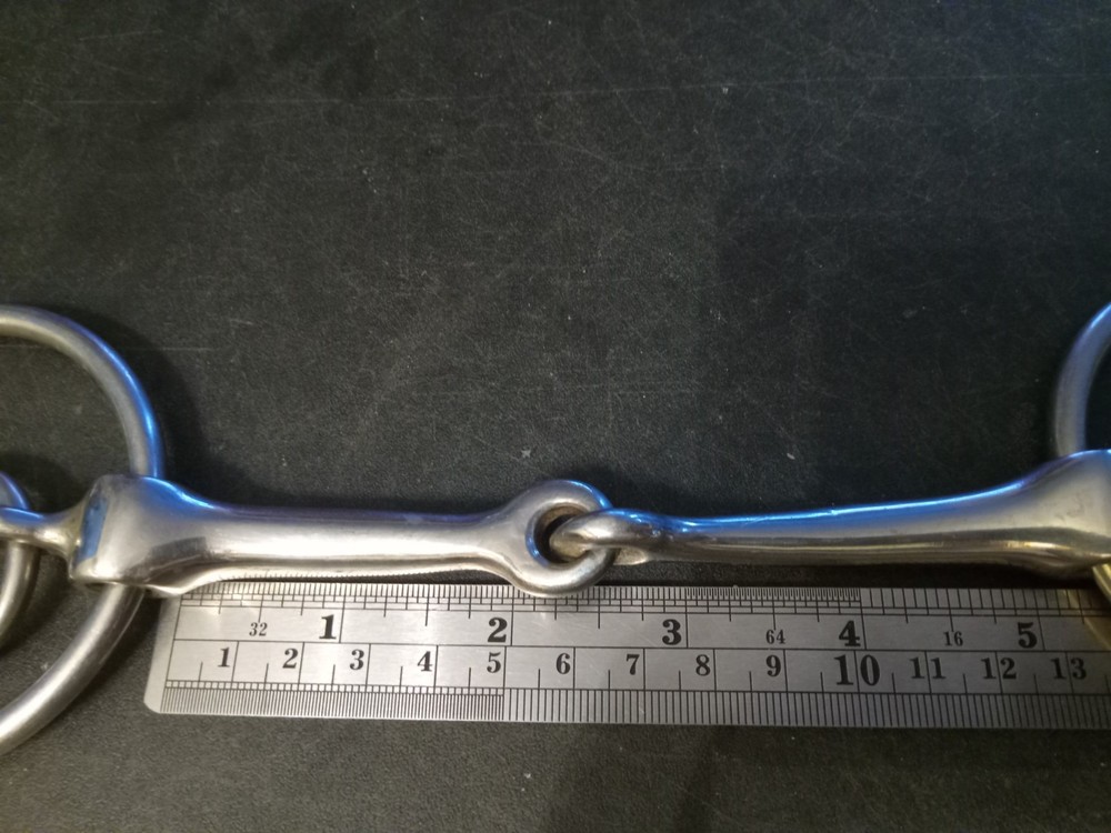 loose ring 4 ring snaffle bit 5 in mouth like a Sims bit