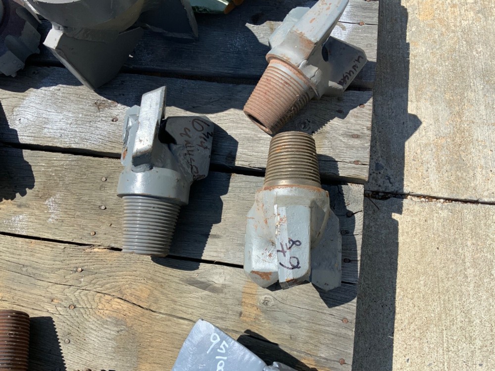 Blade drag bits . Most are new . All sizes