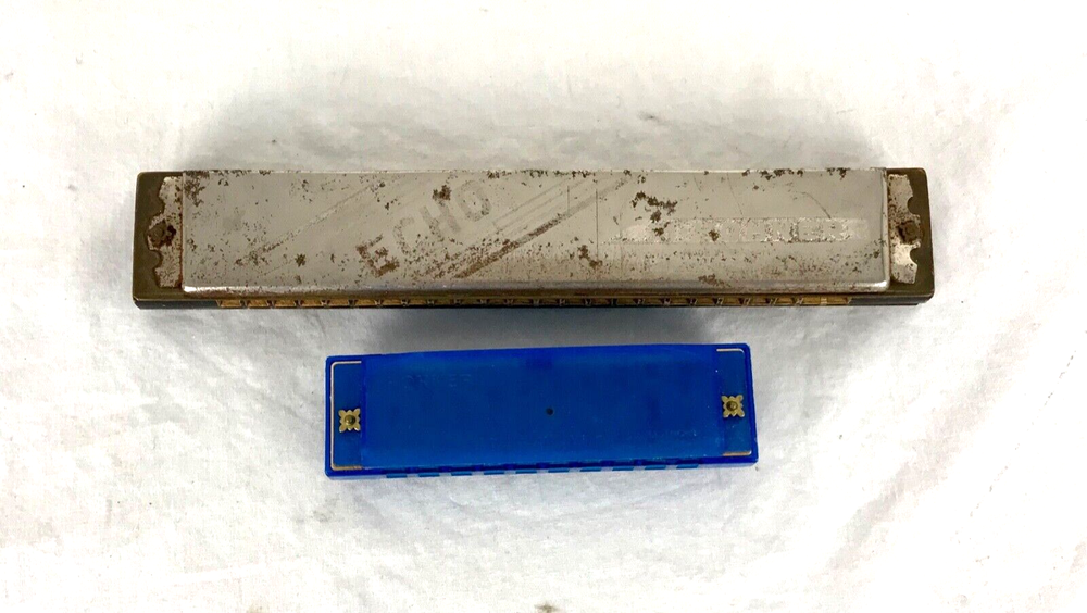 Two Hohner Harmonicas. Hohner Echo (C) & Blue Hohner (C)
